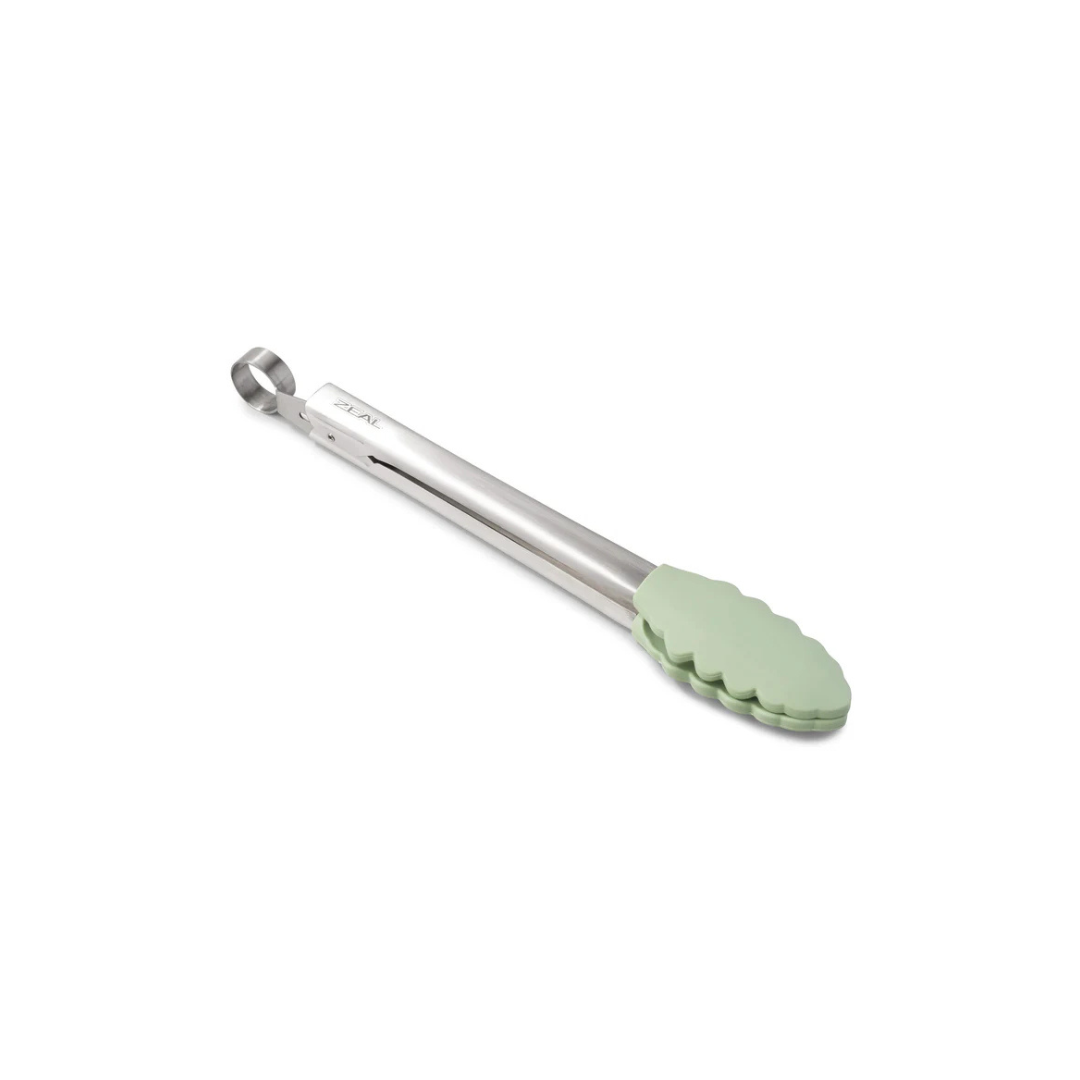 Grip, flip, and serve with ease using the Silicone Tongs in Coastal Green! Featuring scalloped, non-scratch silicone tips, these premium kitchen tongs provide the perfect hold for everything from delicate greens to sizzling steaks. The brushed stainless steel handle offers durability, while the smart locking mechanism keeps them neatly stored when not in use.