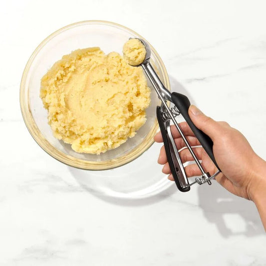 Meet your new baking bestie - the Small Cookie Scoop! This little size 70 wonder holds exactly 1 tablespoon of dough to create adorably uniform 2-inch cookies every single time. Perfect for whipping up bite-sized treats for holiday parties, bake sales where you want to show off, or sneaking extra love into lunchboxes!