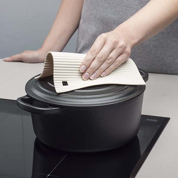 The Zeal Silicone Trivet Mat is the ultimate kitchen multitasker, protecting your countertops and tables from hot pots, pans, and dishes with its non-slip, heat-resistant design (up to 250ºC/482ºF). This 9" x 9" mat isn’t just for hot cookware—it doubles as a potholder, placemat, jar opener, or even a stabilizer for mixing bowls and cutting boards.
