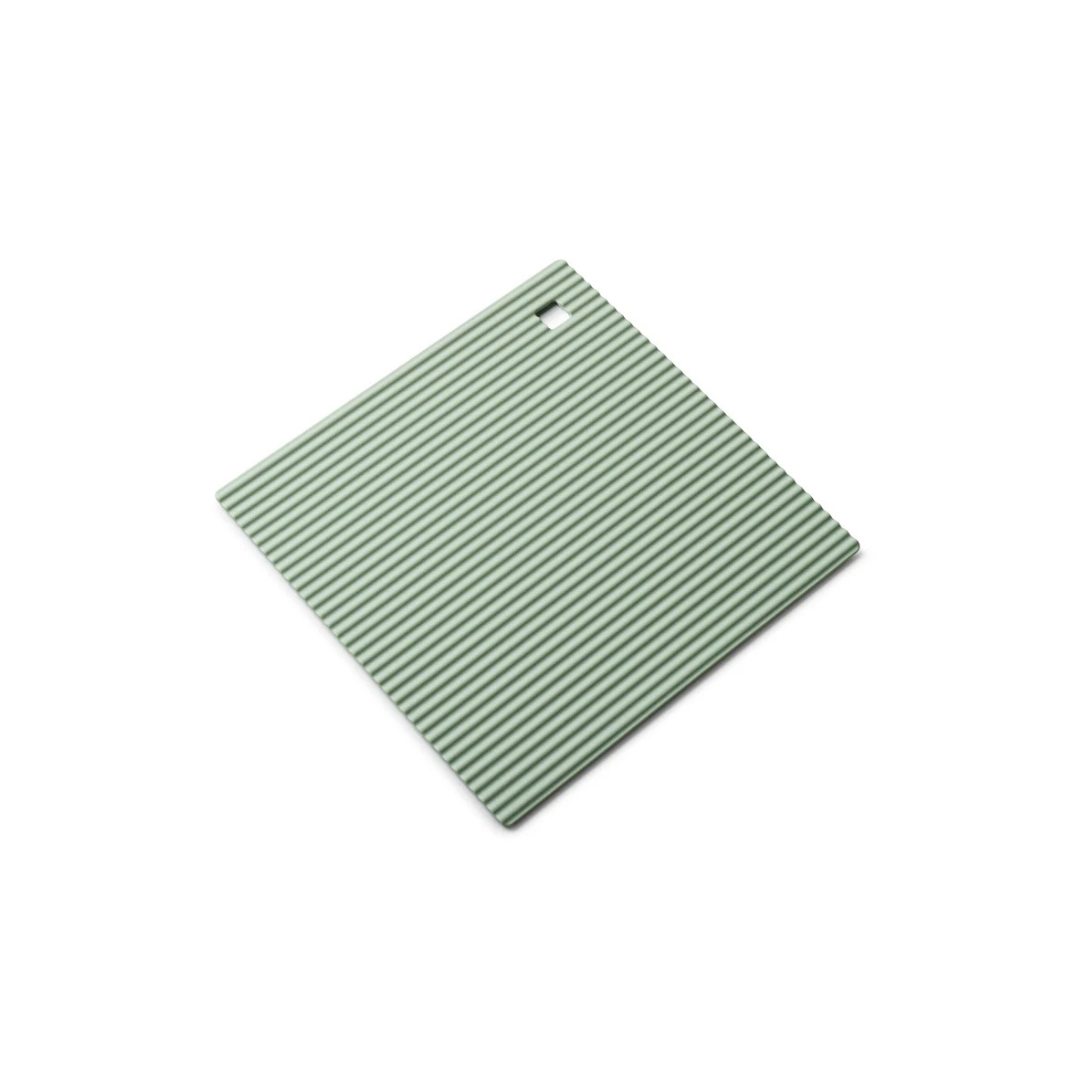 The Zeal Silicone Trivet Mat is the ultimate kitchen multitasker, protecting your countertops and tables from hot pots, pans, and dishes with its non-slip, heat-resistant design (up to 250ºC/482ºF). This 9" x 9" mat isn’t just for hot cookware—it doubles as a potholder, placemat, jar opener, or even a stabilizer for mixing bowls and cutting boards.