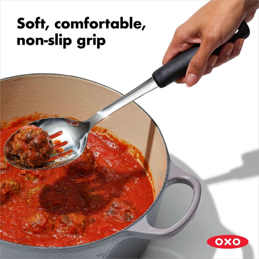The clever slots work like tiny waterslides for excess liquid while keeping your food firmly on board. The cushy non-slip handle feels like a warm hug for your hand during kitchen adventures, preventing any mid-scoop slippage disasters.