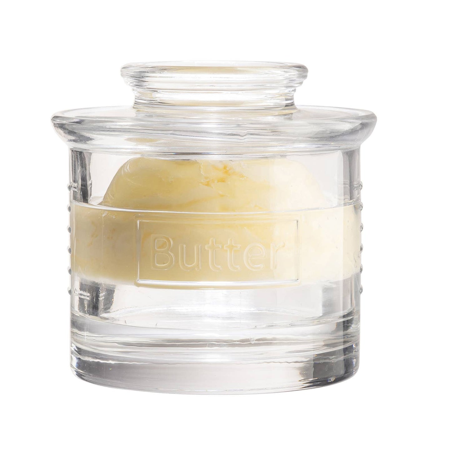 Clear glass container with a block of butter inside on a white background