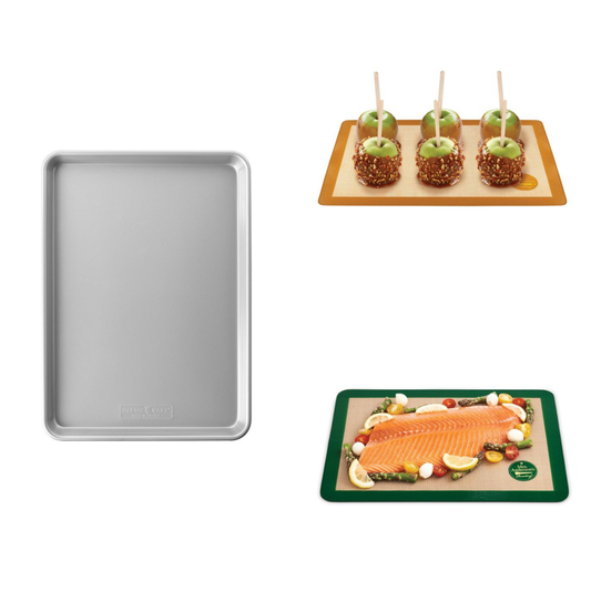 Baking tray, dessert platter with apples, and salmon dish on a white background
