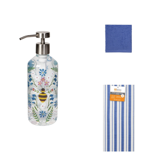 Decorative soap dispenser with floral design, blue cleaning cloth, and striped kitchen towel on a white background.