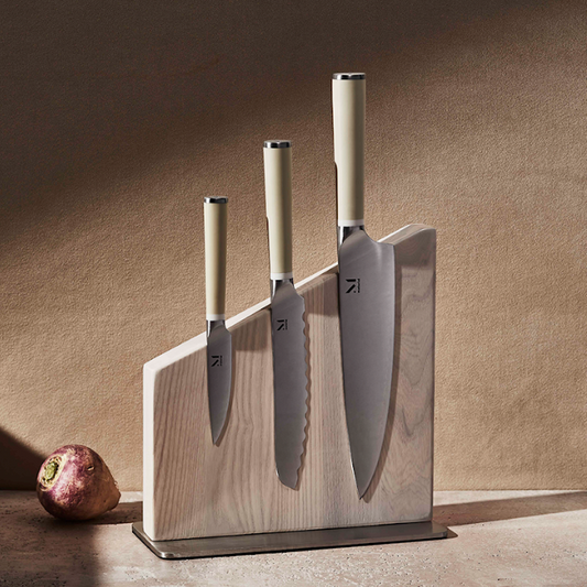 Just the right size, just the right weight, just what you need. A trio of high-performance knives, made from cryogenically-tempered Japanese stainless steel and high carbon making them meticulously sharp and incredibly resilient. With a matte, stain-resistant handle, you’ll want to show these off (The Stand can help).