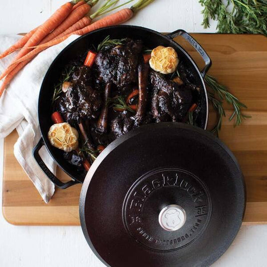 The Blacklock Triple Seasoned 4Qt Braiser with Lid, crafted by Lodge, America’s oldest family-owned cast iron cookware foundry, brings heirloom-quality cookware to your kitchen. Triple seasoned for a natural nonstick finish, it’s perfect for sautéing, frying, slow roasting, or making stock and soup.