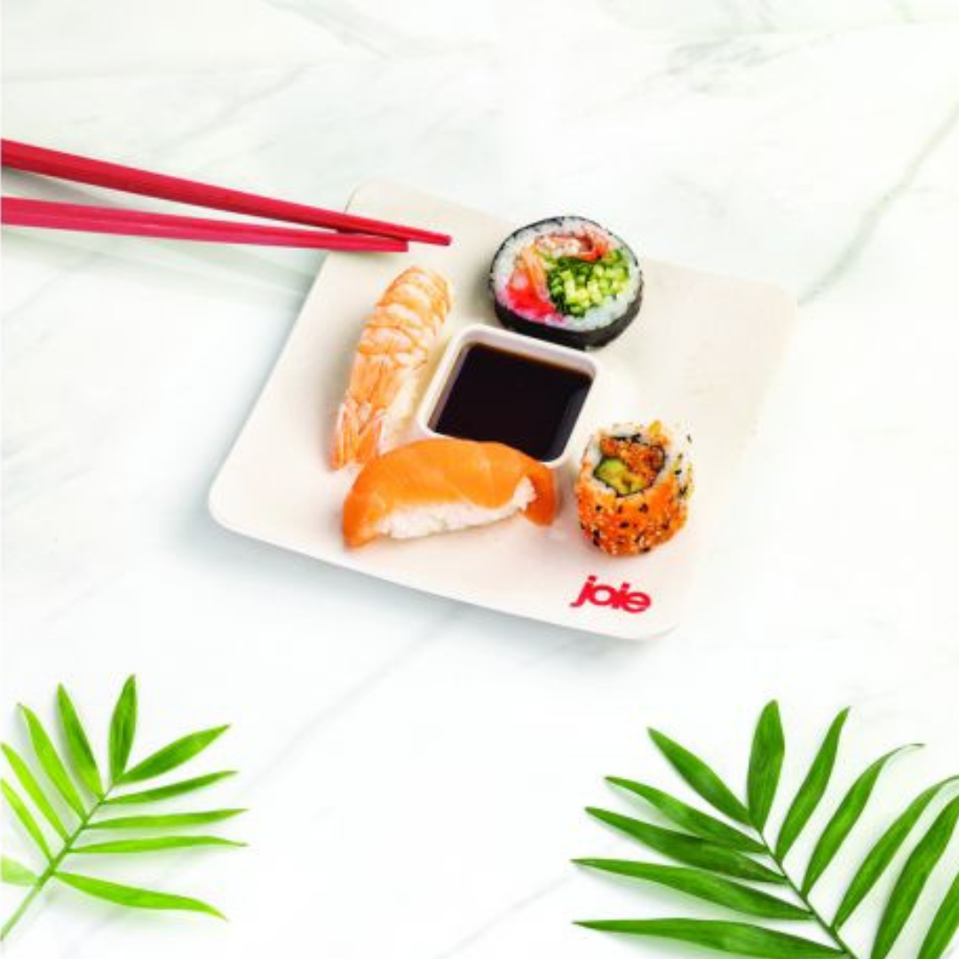 Reusable sushi set. Includes 2 plates with soy sauce holder and 2 sets of chopsticks.