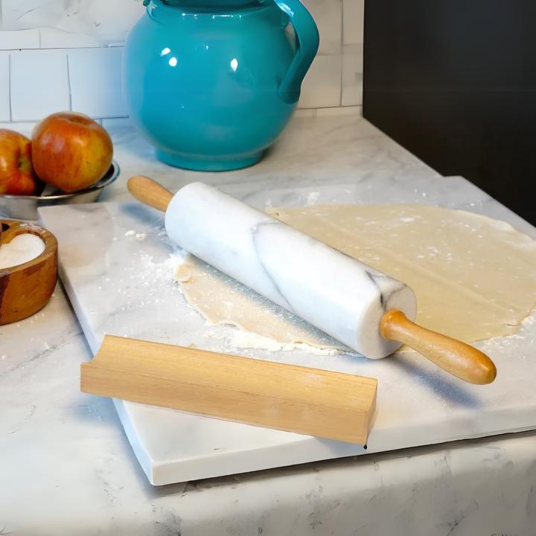 Natural alabaster marble atop polished hardwood handles and stand - an eye-catching addition to any countertop and stows away with ease. Specifically crafted for cool pastry dough, this heavy and efficient design is dependable and beautiful! Roll out the red carpet for the pastry chef in your life! This stunning rolling pin is sure to lend some serious wow to any countertop - all while producing that perfect, flaky crust time and time again.