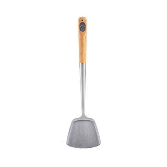 A stainless steel wok spatula with a bamboo handle.