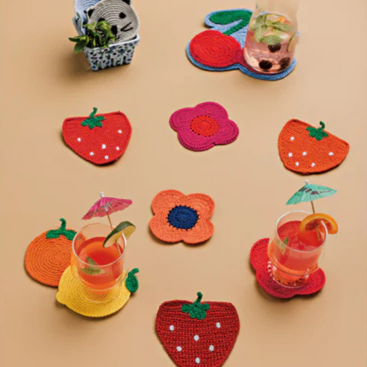 Bring a touch of handcrafted elegance to your table with the Poppy Crochet Coaster Set. Featuring a lively blend of vibrant reds, soft petal pinks, and cool blues, these intricately crocheted coasters celebrate the bold beauty of the poppy.