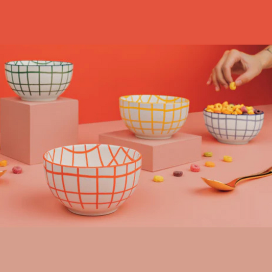 Add a burst of color to your everyday meals with the Wobbly Check Bowls set! This cheerful set of four bowls in blue, green, orange, and yellow is perfect for brightening up breakfast, adding flair to lunch, or serving soup with a smile.