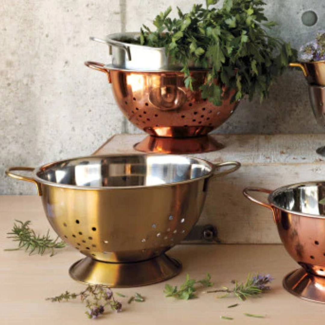 Add a touch of glam to your kitchen with the Large Gold Colander by Now Designs! Made from durable powder-coated stainless steel, this practical yet stylish colander is perfect for straining pasta, rinsing fruit, and washing salad greens.