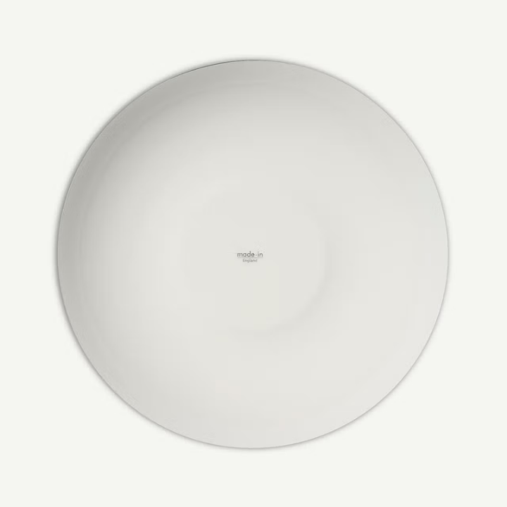 Round white plate with 'Made in Italy' text on a white background