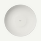 Round white plate with 'Made in Italy' text on a white background