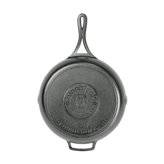 Versatile Blacklock 12" skillet for all cooking methods. Triple seasoned for nonstick. Lightweight with raised handle, pour spouts, and elevated assist handle for comfort and control. Made in USA, no PFOA/PTFE.