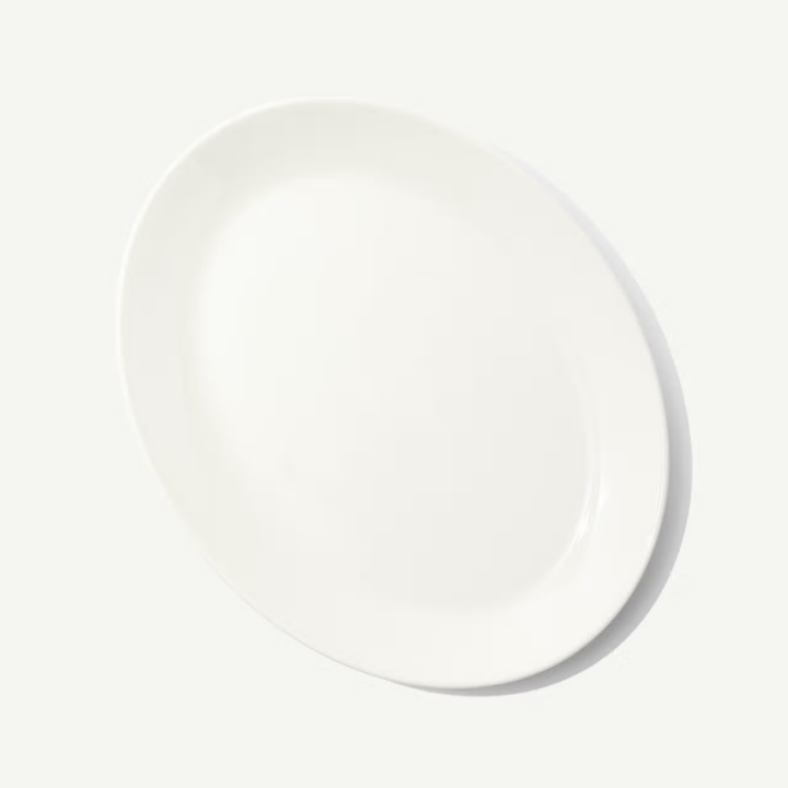 White ceramic plate on a light gray background