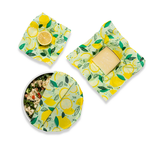 Set of four items with lemon pattern on a white background