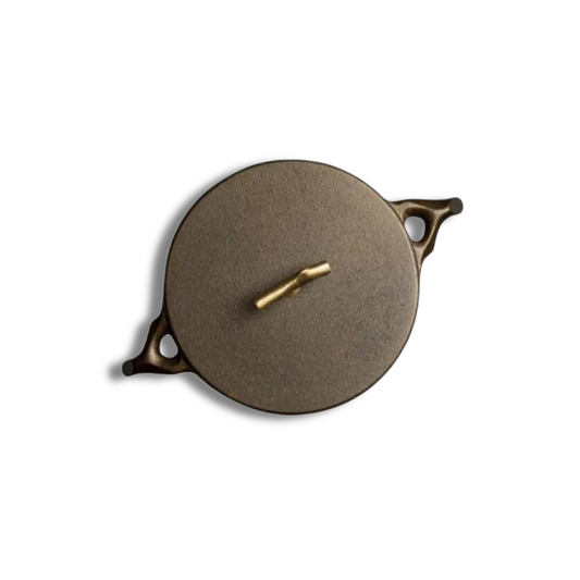 This 3.5 quart Cast Iron Dutch Oven’s interior is machined smooth all the way up the sides, so you can transition from searing to roasting with optimal ease. Included is a self-basting lid topped with a glistening brass knob which also fits the 9” Skillet. The handles on this gorgeous piece of functional art have been modeled after a cherry tree branch and the formed for optimal hand comfort.  