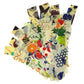 Collection of colorful fabric squares with various patterns on a white background