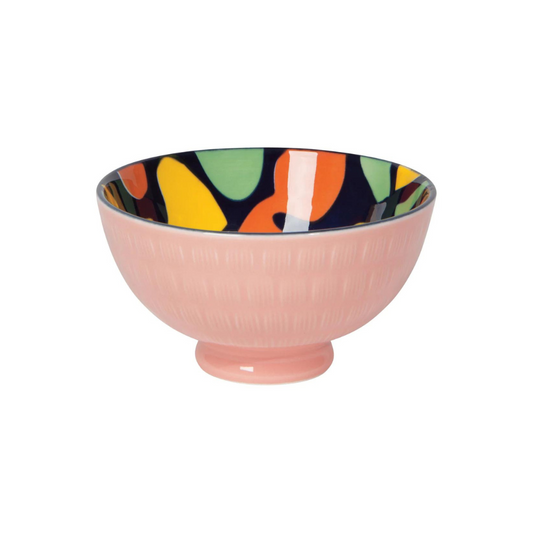 This textured porcelain bowl with bold patterns is a versatile addition to your home - it works as a kitchen bowl, front door key-holder, ice cream dish, jewelry and ring dish, palo santo and incense burner, and whatever else you can dream up! And don't forget the eye-catching stamped design and hand-painted rim that adds a bright pop to any room.