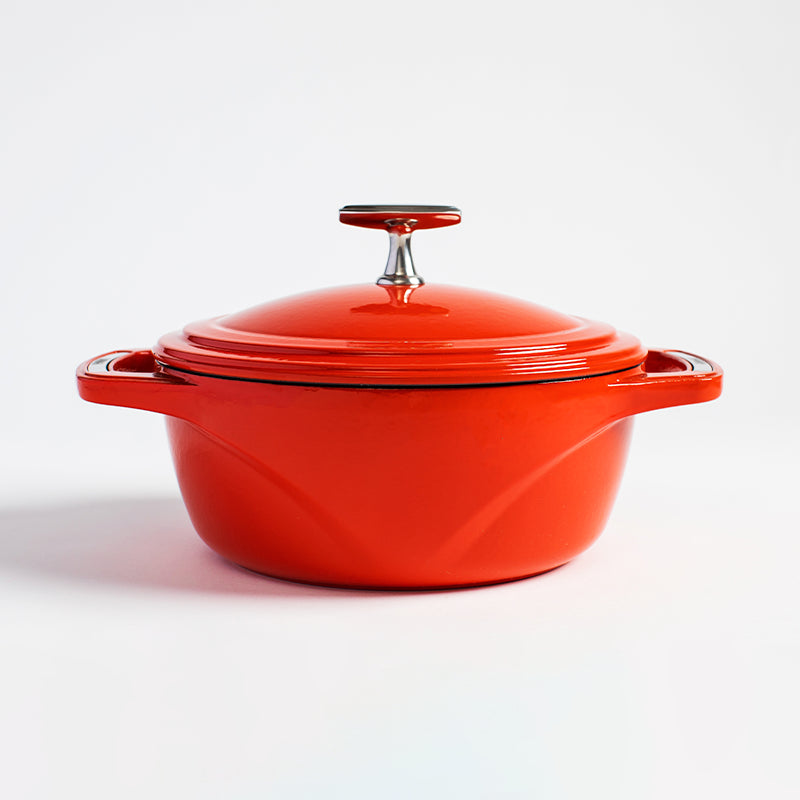 USA-made Red Enamel Dutch Oven in 4.5 quart by Lodge. Durable and versatile, create original recipes easily with this kitchen essential. From braising to deep-frying, it can do it all!