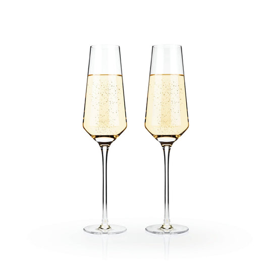 Ideal for effervescent sparkling wine, these stemmed champagne flutes are crafted from a lead-free crystal glass. This glass offers the most-elegant drinkware experience available.  Modern and classy, these glasses are sleek with precise angles. They are perfect for any occasion or the finest of dinner parties. The well-crafted construction results in a pair of wine glasses that will stand the test of time.