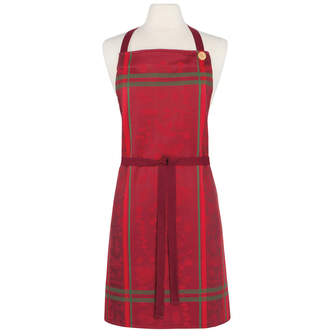 Red apron with green accents on a mannequin against a white background