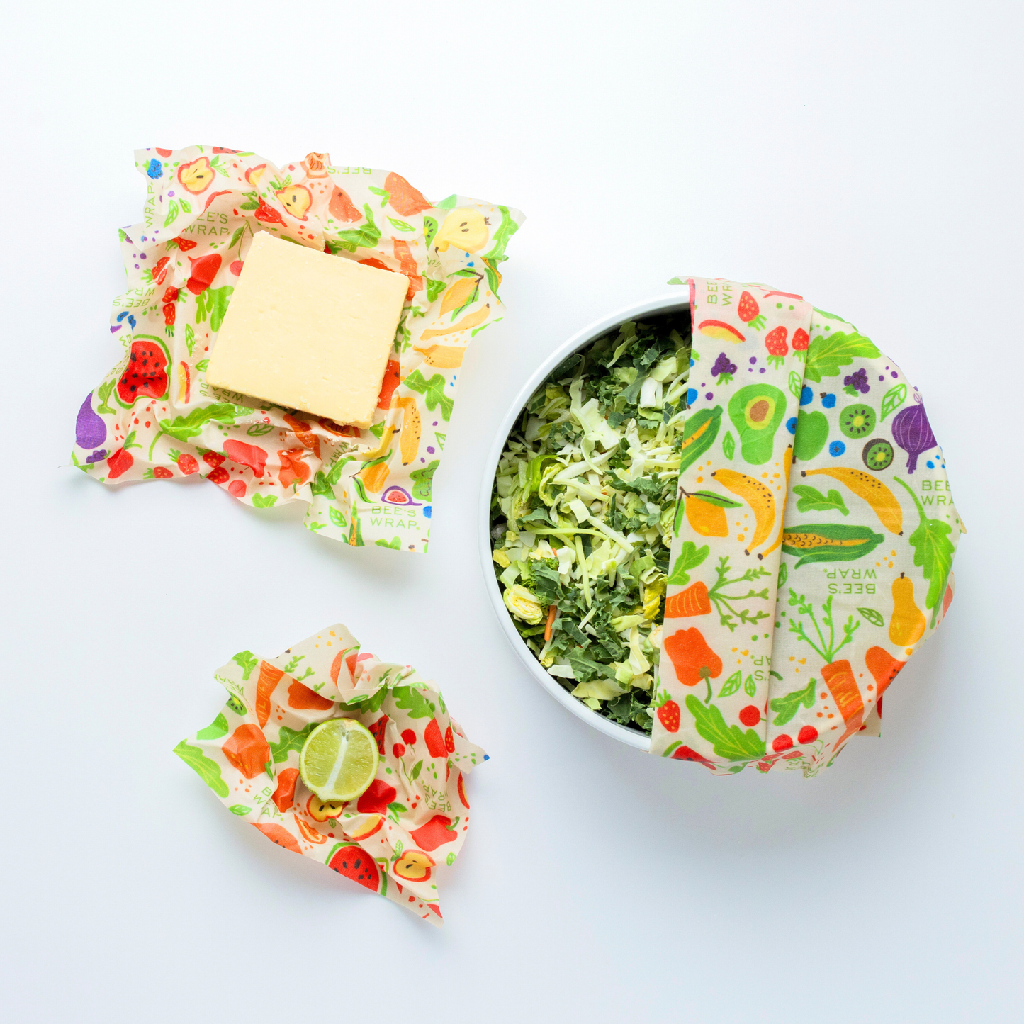 Colorful wrap with a pattern of fruits and vegetables on a white background