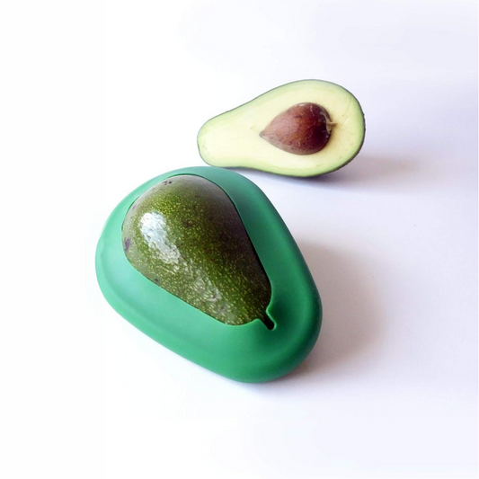 Avocado Food Huggers are designed to keep the leftover half fresh for longer. Our set of two sizes makes sure you’re covered for avocados large and small. And the unique pit pocket can be pushed in or out, ensuring a good hug whether the half you’re saving has the pit or not. 100% BPA & phthalate-free. 100% FDA food-grade silicone. Dishwasher safe. Lifetime guarantee.