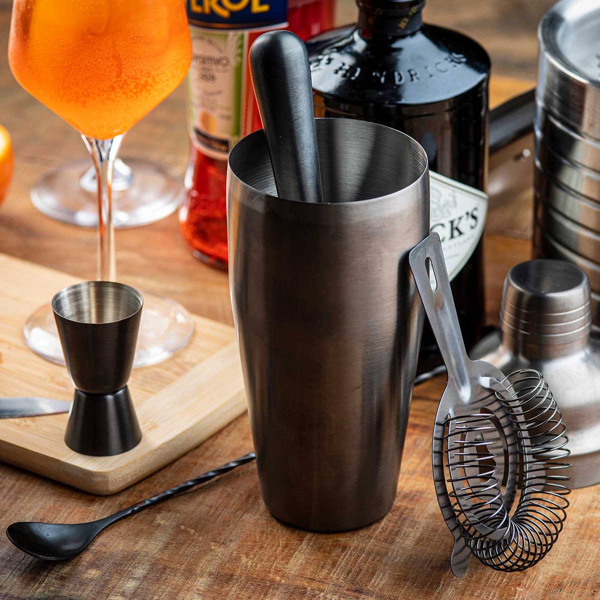 a stylish matte gunmetal black finish and includes a 24-ounce 3-piece Cocktail Shaker, a Jigger with 0.5- and 1-ounce capacities, a 4-Prong Strainer, a Muddler, and a Bar Spoon.