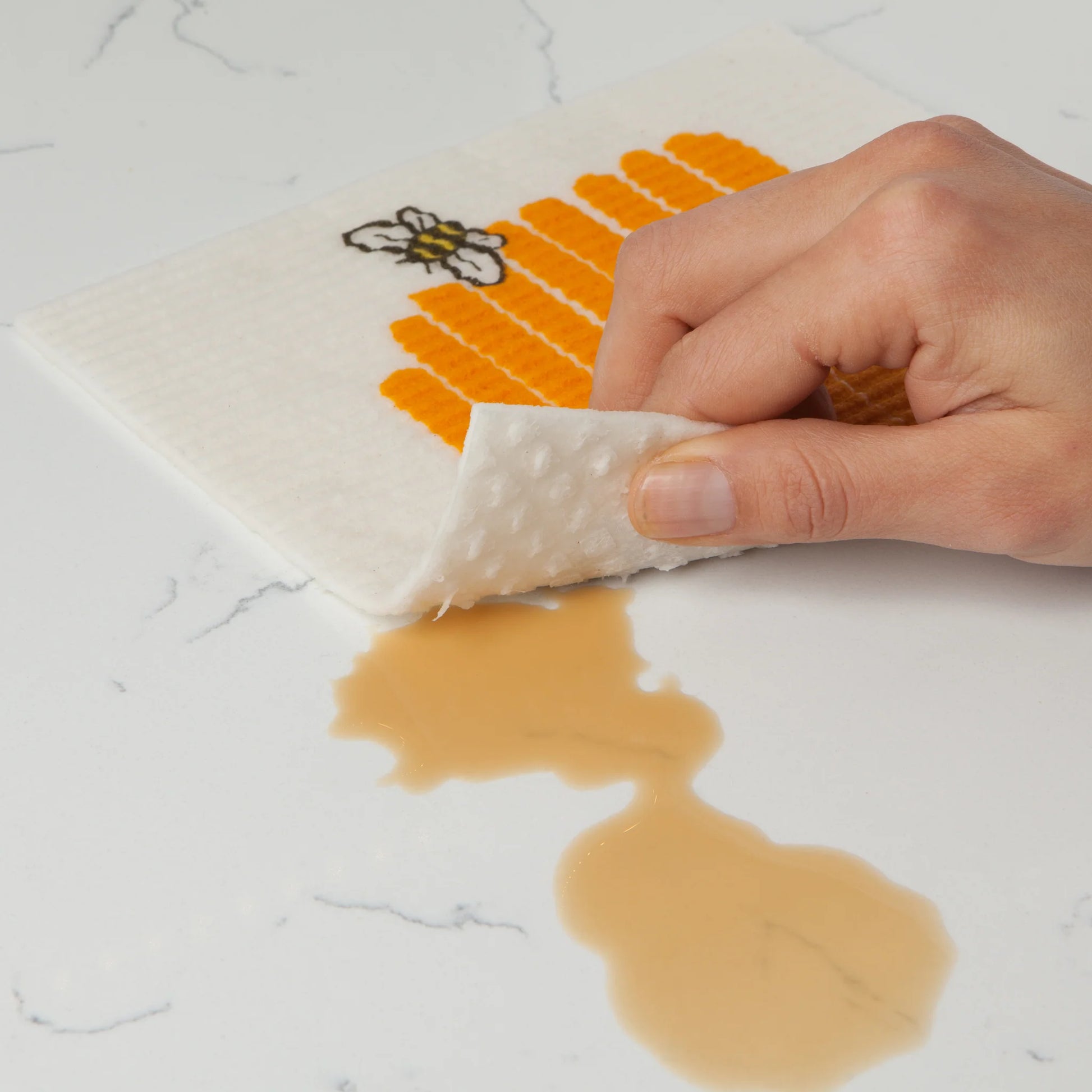 Busy Bees gather to brighten up kitchens and bathrooms and these Ecologie sponge cloths are so versatile they buzz all around your home cleaning up wet messes and washing dishes