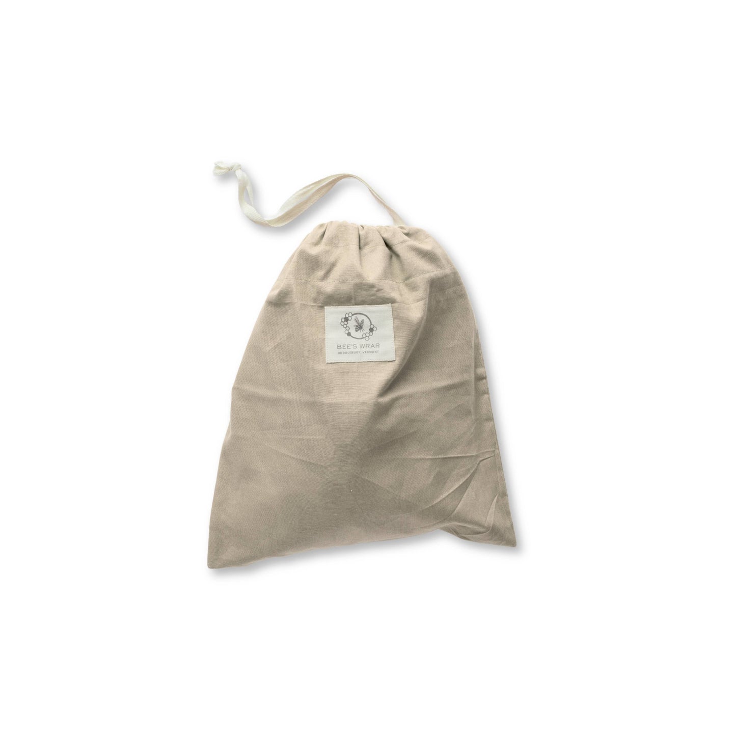 Beige drawstring bag with a label on a white background