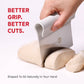 Hand using a dough cutter on kneaded dough with text 'Better Grip. Better Cuts.'