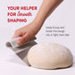 Hand using a dough scraper to shape dough with text on a white background
