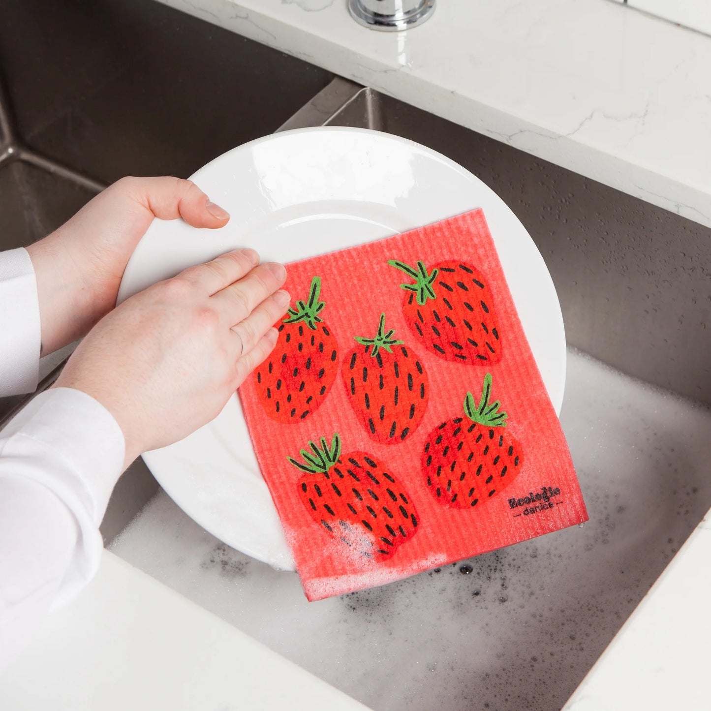 Wipe away sticky messes and make cleaning a treat with a Berry Sweet Swedish Dishcloth by Ecologie. Decorated with tasty, ripe strawberries, this dishcloth offers reminders of sweet summertime fun all year round. 