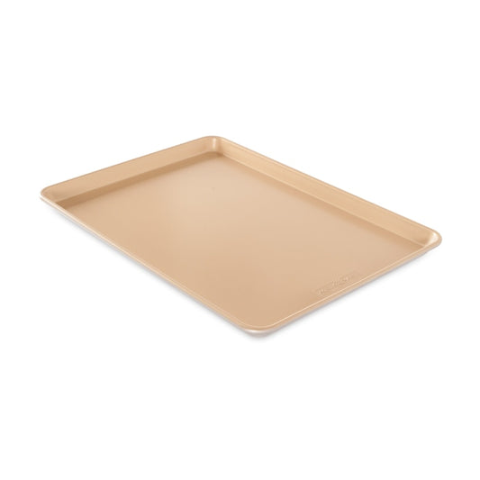 Make mega batches of cookies and bars with this extra-large sheet pan. Fits all standard size ovens. Baking professionals know that the secret to evenly baked and perfectly browned food is to cook with aluminum bakeware. Aluminum is widely known for its excellent heat conductivity and cooks more evenly and thoroughly than other metals. Features a galvanized steel reinforcement around the rim to prevent warping. Premium nonstick interior for easy release and cleanup. Proudly made in the USA.