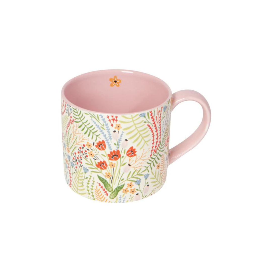 Bouquet Mug! Adorned with a cheerful wildflower pattern on the outside and a lovely pop of pink on the inside