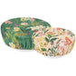 Two floral-patterned fabric covers on  white bowls