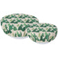 Two round cushions with green tree pattern on a white background