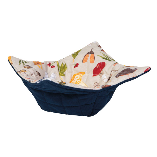 Bowl cozy with nature-themed fabric on a white background