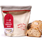 Kneadace roll-top bread bag with a loaf of bread on a white background