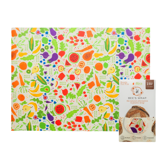 Colorful beeswax wrap with vegetable pattern and branded packaging on a white background