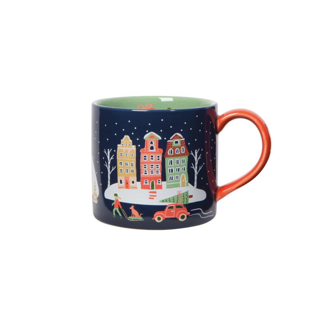 f Candy Cane Lane with the Danica Jubilee Mug in a Box set! Nestled in a cozy winter wonderland of twinkling lights and starry skies, this ceramic mug and gift box set brings holiday cheer to every sip. The 14-ounce stoneware mug features delightful designs that brighten up the season and comes in a giftable box perfect for stashing trinkets and treasures long after the holidays. 