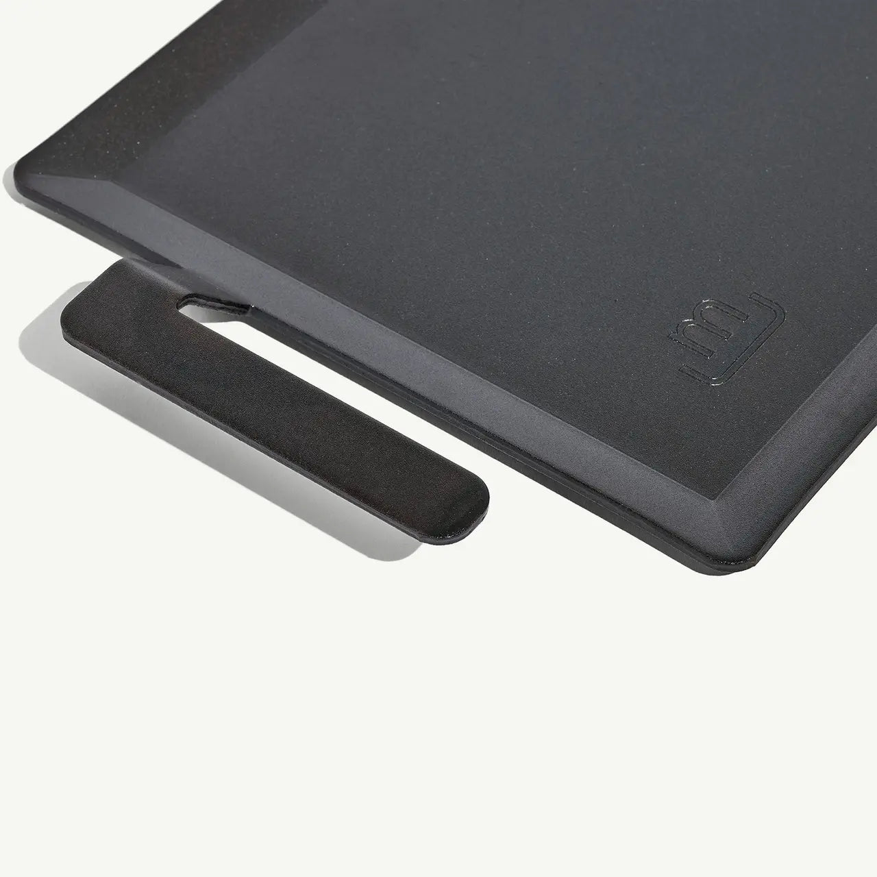 Black rectangular griddle on a white background
