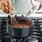 Perfect for simmering sauces, warming soups, or prepping small sides, the Valencia Pro 2-Quart Saucepan is a compact powerhouse in the kitchen. Crafted from hard anodized aluminum for superior strength and durability, it features a diamond-infused ceramic nonstick coating that delivers effortless release and quick cleanup—no soaking required.