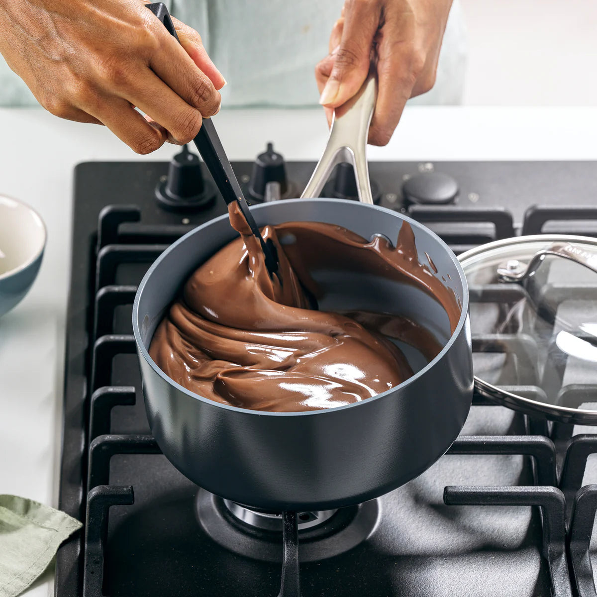 Perfect for simmering sauces, warming soups, or prepping small sides, the Valencia Pro 2-Quart Saucepan is a compact powerhouse in the kitchen. Crafted from hard anodized aluminum for superior strength and durability, it features a diamond-infused ceramic nonstick coating that delivers effortless release and quick cleanup—no soaking required.