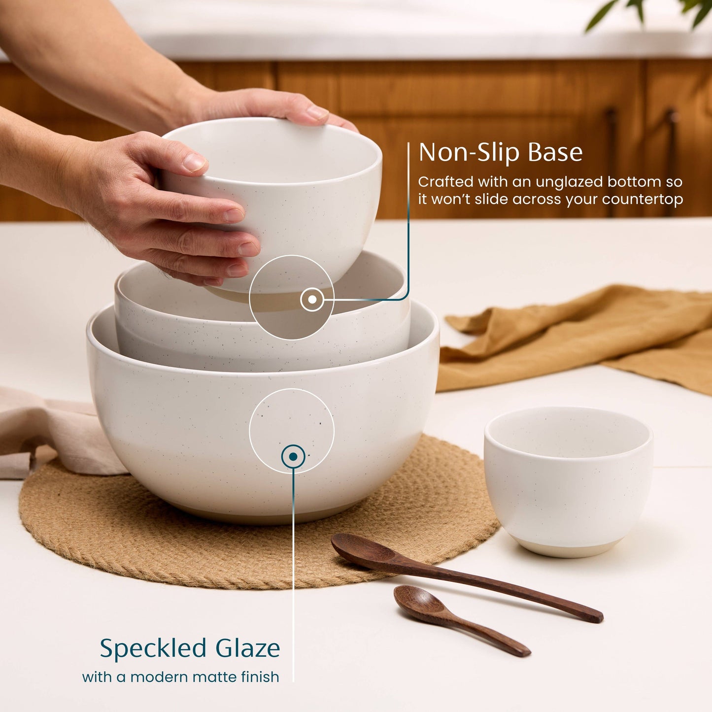 White ceramic bowls with non-slip base feature on a kitchen counter.