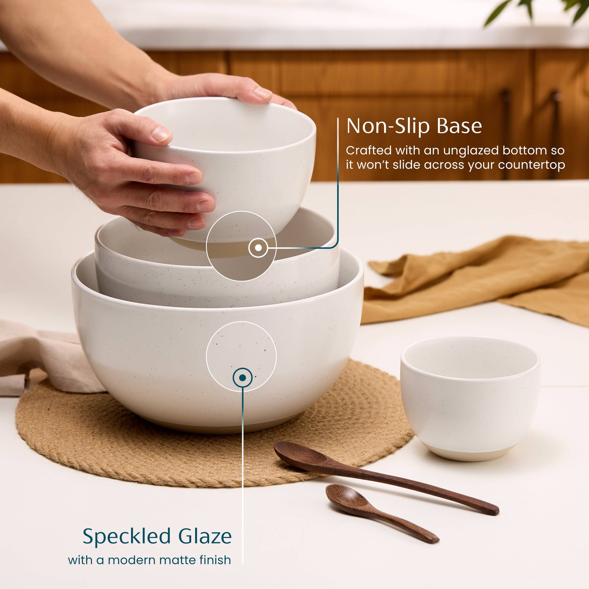 White ceramic bowls with non-slip base feature on a kitchen counter.