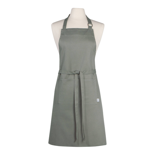 Gray apron on a mannequin against a white background