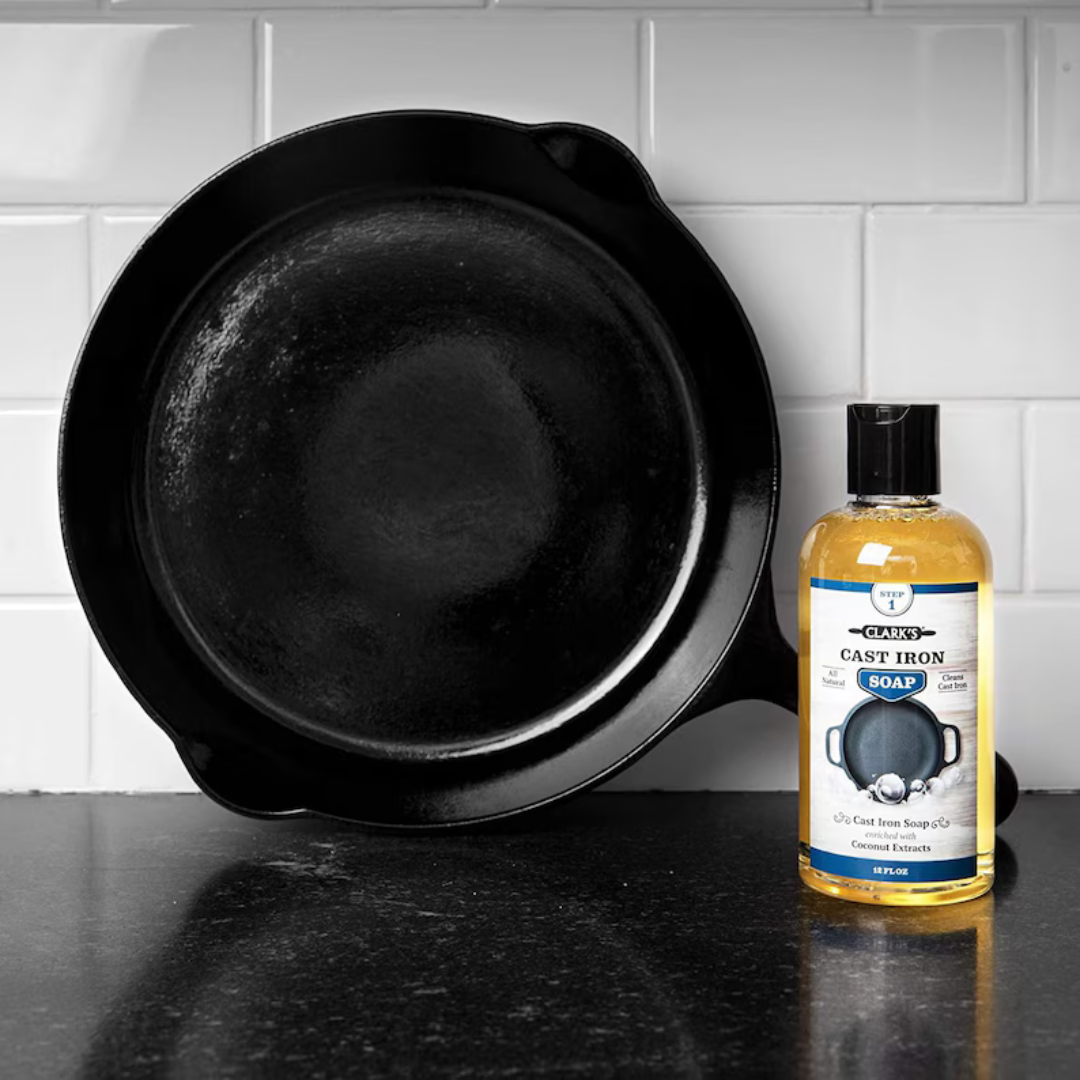 Clark's cast iron soap on counter with freshly washed cast iron skillet